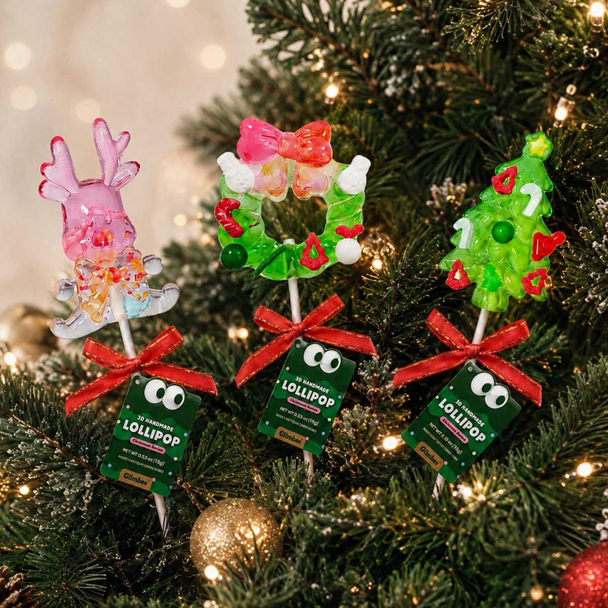 Glimboo Crystal Xmas Series handcrafted 3D art lollipops arranged on a Christmas tree with reindeer, wreath, and tree designs